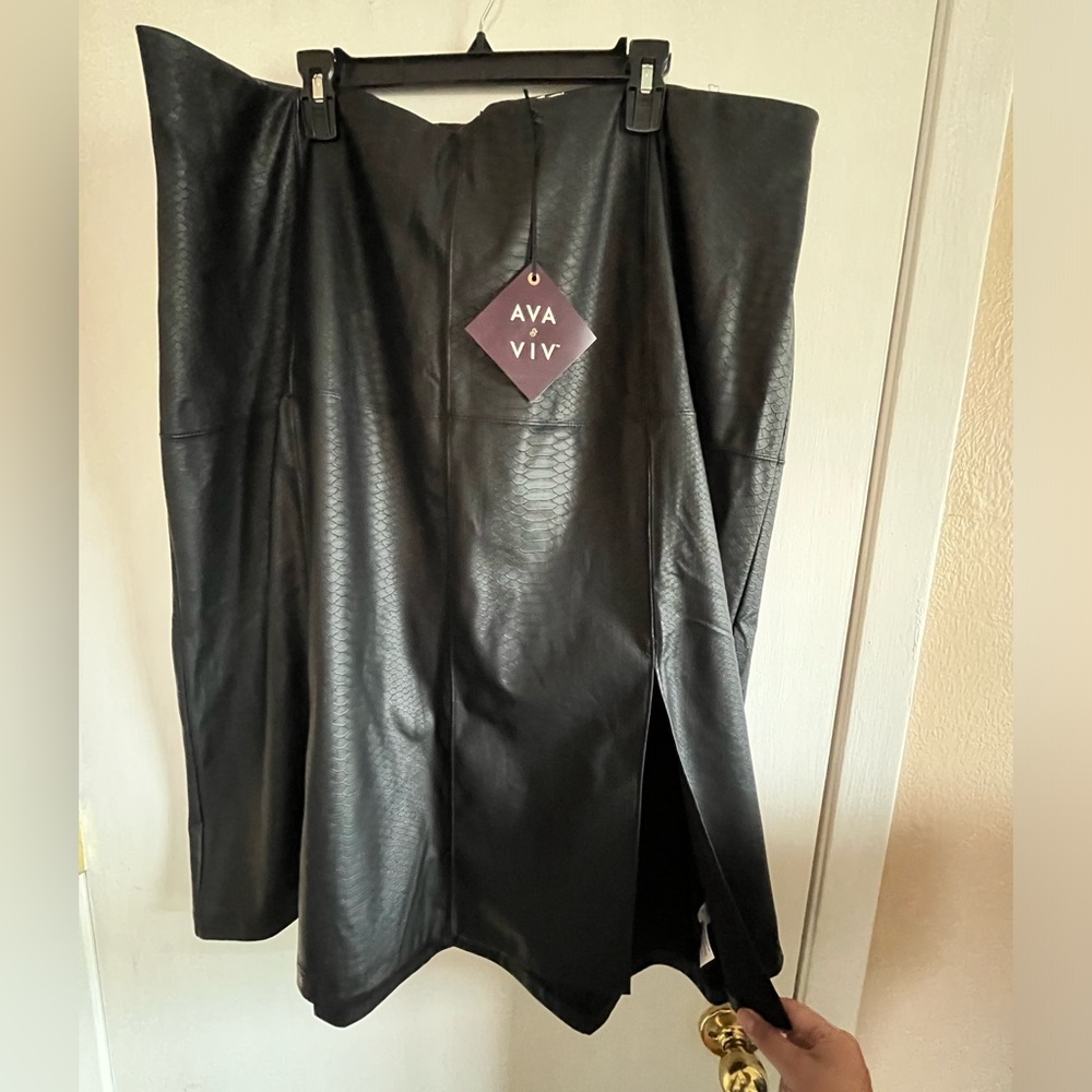 New with tags! Super cute Ava & Viv faux snake skin leather skirt.